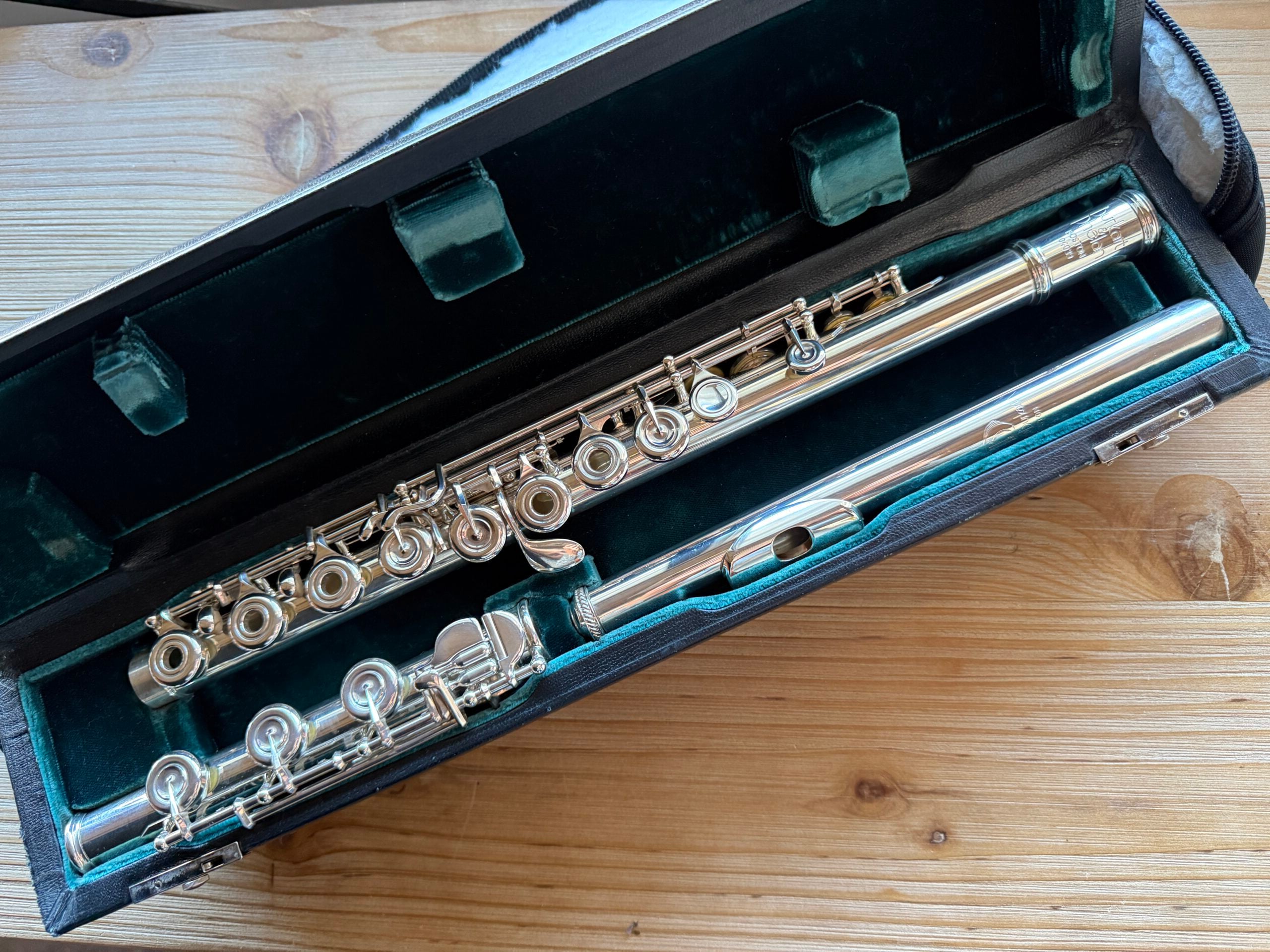 used Burkart Phelan flute in solid silver with 14k gold riser headjoint and B foot